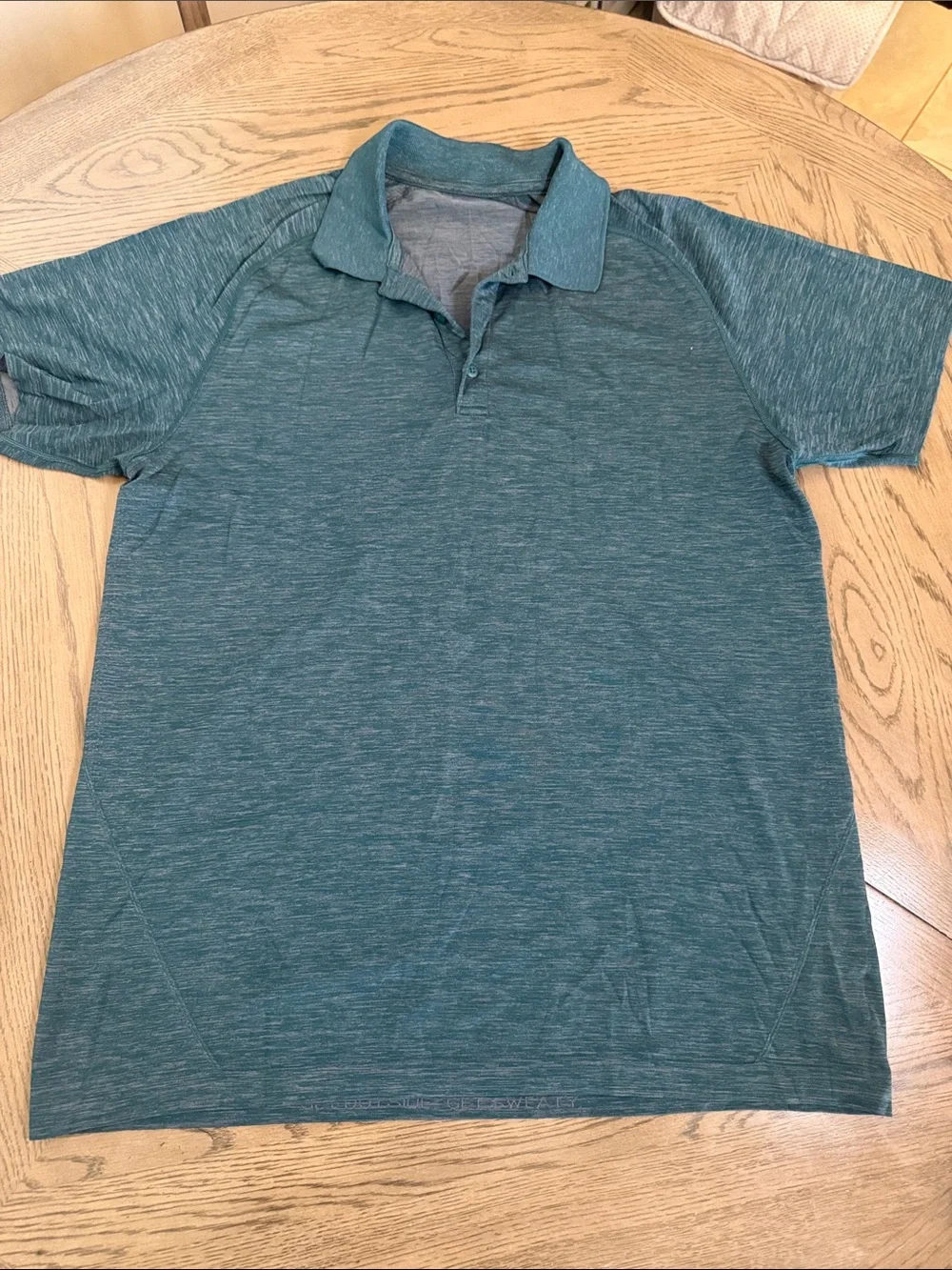 Lululemon Men's Heather Teal Polo Shirt